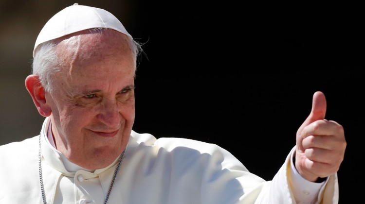 Pope Francis gives his thumb up as he leaves at the end of his weekly general audience in St. Peter's square at the Vatican, Wednesday, Sept. 4, 2013. (AP Photo/Riccardo De Luca)