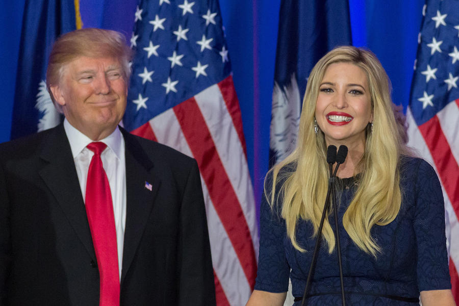 epa05173114 Ivanka Trump (R), daughter of Republican presidential candidate Donald Trump (L) thanks supporters celebrating her father's victory in the South Carolina Republican primary in Spartanburg, South Carolina, USA, 20 February 2016.  Billionaire businessman Donald Trump was the projected winner of the Republican primary in the southern US state of South Carolina.  EPA/RICHARD ELLIS